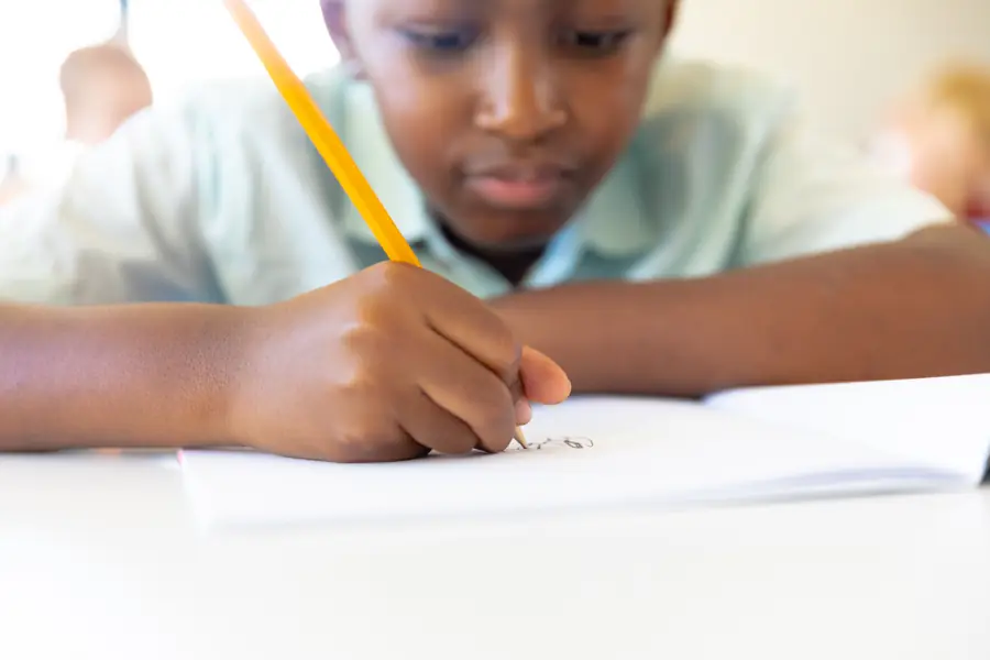 Learner writing in class